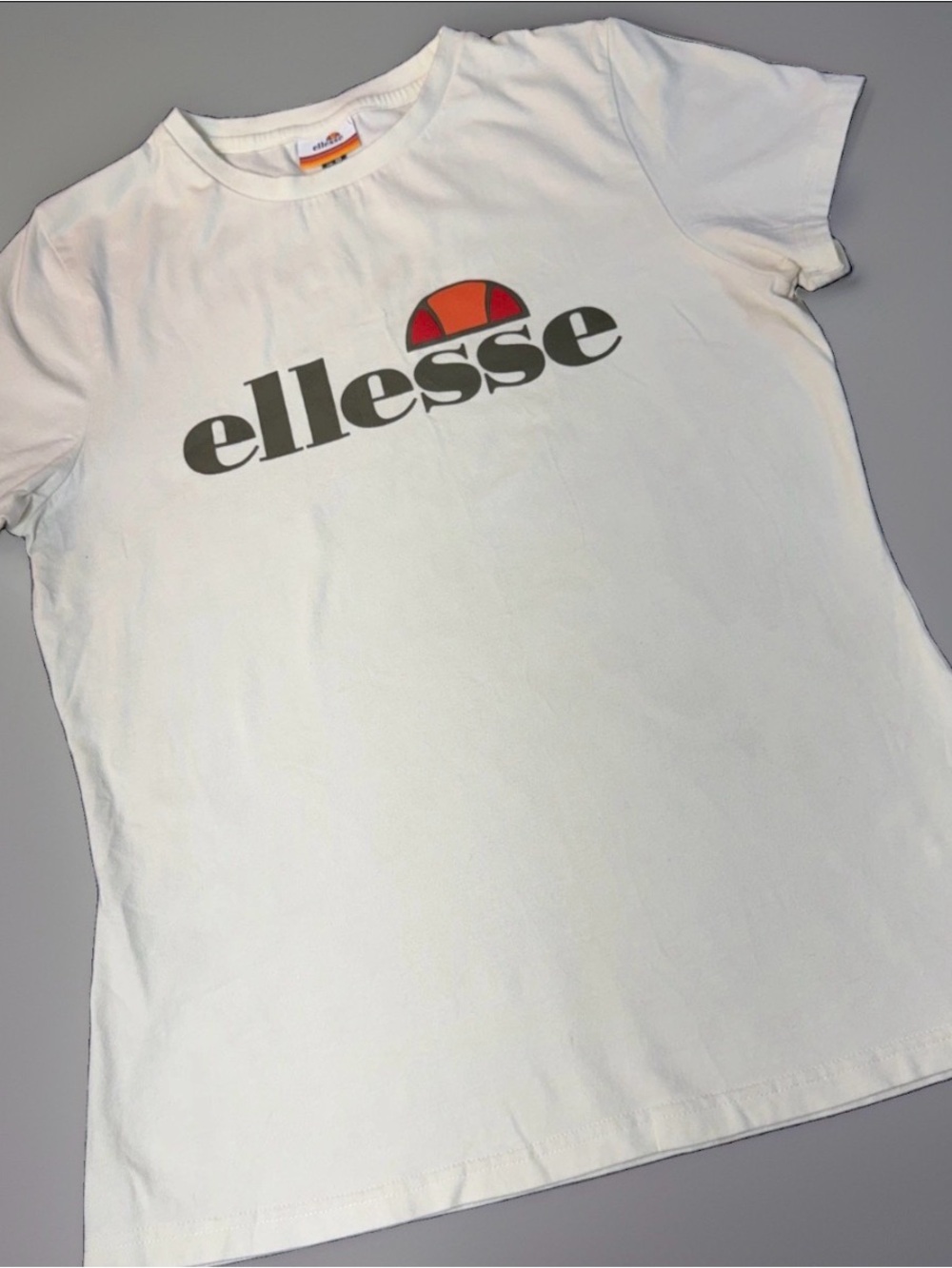 ellesse White Logo T-Shirt with Red/Orange Accent